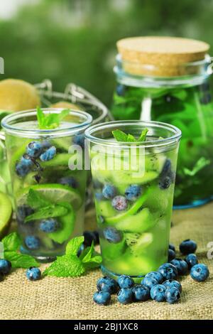 kiwi-and-blueberry-cocktails-on-bright-background-stock-photo-alamy