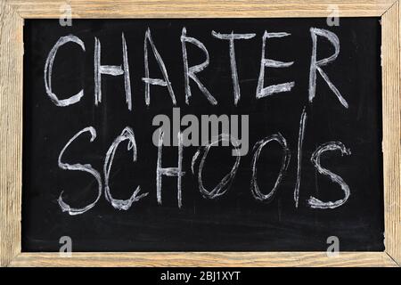 Charter Schools written on chalkboard Stock Photo