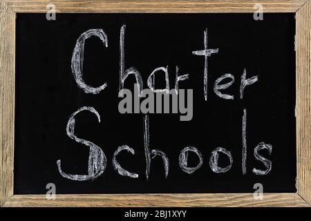 Charter Schools written on chalkboard Stock Photo