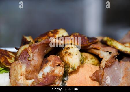 Street food displayed during food festival. Mexican, Indian, Asian, British specialties. Fresh Food Buffet Brunch Catering Dining Eating Party Sharing Stock Photo