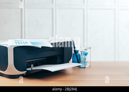 Copier or printer in a modern office interior close up Stock Photo
