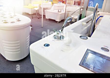 Modern bathtubs and jacuzzi in the store Stock Photo