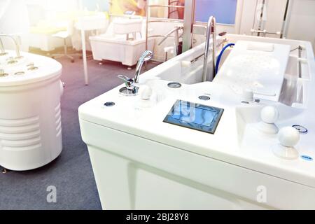 Modern bathtubs and jacuzzi in the store Stock Photo