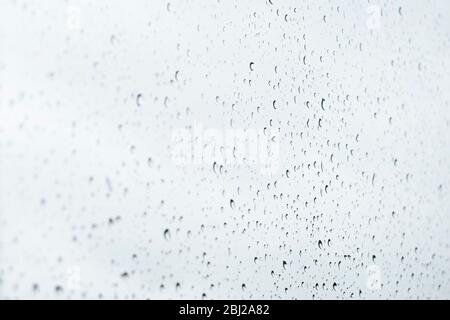 Raindrops on a window pane Stock Photo