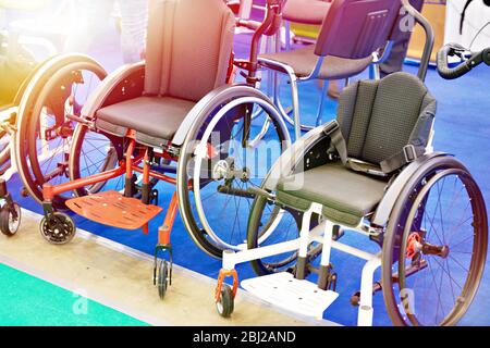 Wheelchairs for sport on exhibition store Stock Photo