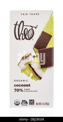 Winneconne,  WI - 26 April 2020:  A package of Theo organic coconut dark chocolate bar on an isolated background. Stock Photo
