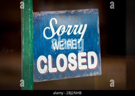 Closed sign in a shop window Stock Photo