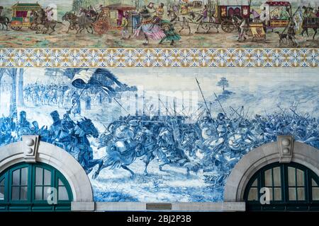 Detail of famous azulejos traditional Portuguese blue and white wall tiles Sao Bento railway station in Porto, Portugal Stock Photo