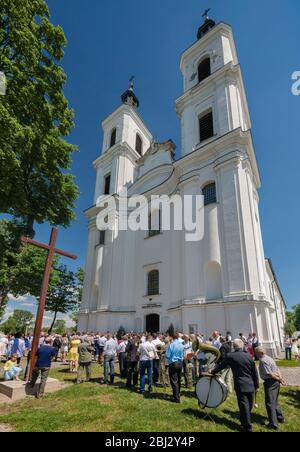 Norbertine Church, baroque style, village orchestra, Sunday Mass crowd, in village of Witow near Piotrkow Trybunalski, Western Mazovia, Poland Stock Photo