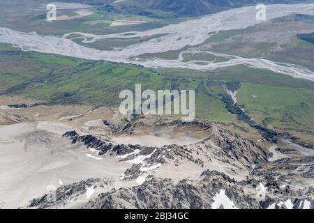 aerial, from a glider, with Dobson and Hopkins rivers confluence near scree slope of Backbone peak, shot in bright spring light from west, Canterbury, Stock Photo
