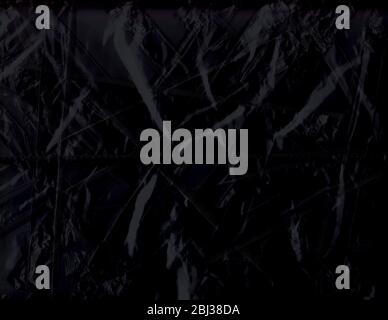 Shiny abstract textured background in a black color for wallpaper or a backdrop Stock Photo