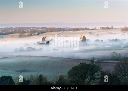 Morning mist over the village of Trellech in South Wales. Stock Photo