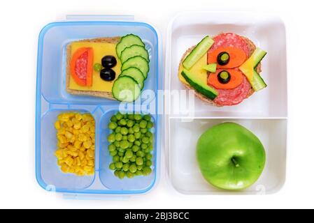 Funny sandwiches in box isolated on white Stock Photo