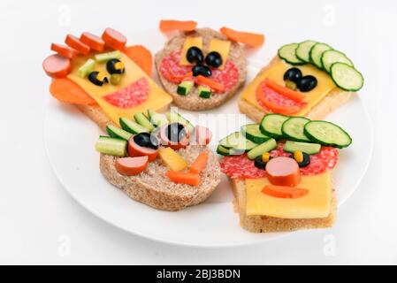 Funny sandwiches isolated on white Stock Photo