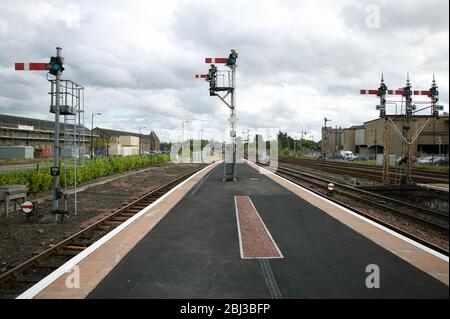 Semaphore signals at a railway station in Scotland - railway train signal signals platform halt stop semaphores semaphore. Stirling station 2010. UK Stock Photo