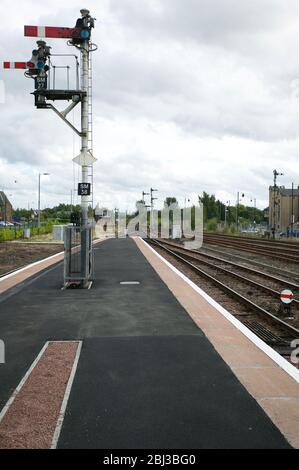 Semaphore signals at a railway station in Scotland - railway train signal signals platform halt stop semaphores semaphore. Stirling station 2010. UK Stock Photo