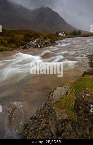 Lagangarbh cottage on the banks of the River Coupall near Glen Coe. Stock Photo