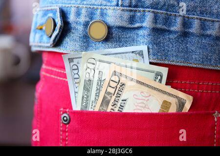 Dollar banknotes in jeans pocket closeup Stock Photo