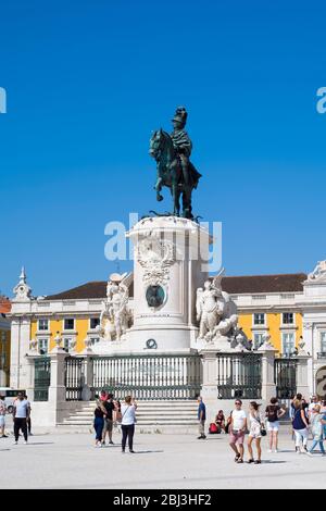 Tourists photographing bronze statue of Jose I on horseback - Portugal's king in Praca do Comercio -Terreiro do Pao, in Lisbon, Portugal Stock Photo