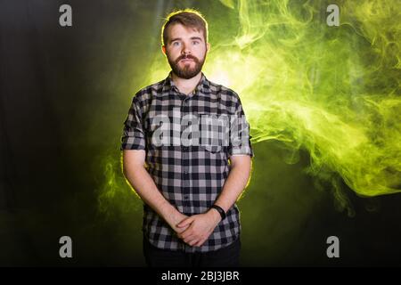 Emotional stunned handsome male has mustache and beard, being shocked with sudden raise of prices, expresses great surprised. Emotions concept Stock Photo
