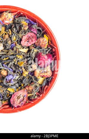 Dry tea herbs, melone and cranberries slices assortment. Healing herbs and herbal medicine concept. Selective focus, copy space, isolated on white Stock Photo