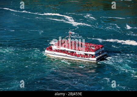 Sightseeing boat approaches Horseshoe Falls in Canada. Stock Photo