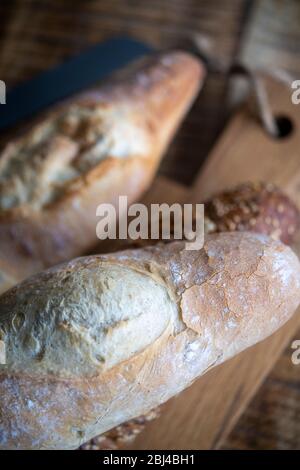 Selection of freshly baked baguettes Stock Photo