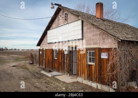 Large blank marquis on old abandoned building in disrepair. Stock Photo