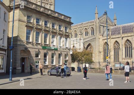 queue of people social distancing outside Lloyds bank during the COVID 19 pandemic in BOSTON Lincolnshire, Stock Photo