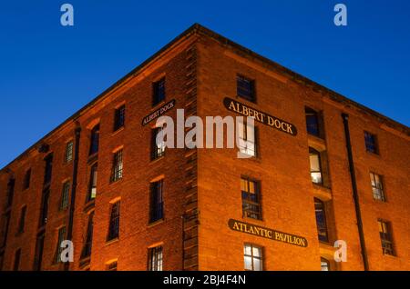 Liverpool, UK : Mar 16, 2019: The Royal Albert Dock is located on Liverpool's UNESCO World Heritage Waterfront. A popular tourist destination at night Stock Photo