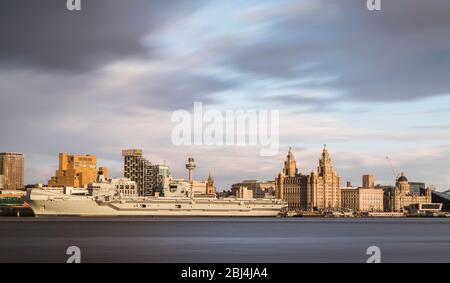 HMS Prince of Wales at sunset in Liverpool. Stock Photo