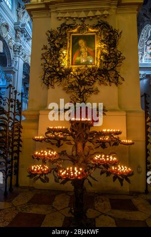 St. Stephen's Cathedral interior- Votive candles, prayer candles, Passau, Bavaria, Germany Stock Photo