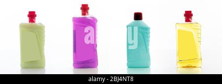 Cleaning products isolated against white background. Plastic chemical detergent bottles set, Domestic household collage or business sanitary cleaning Stock Photo