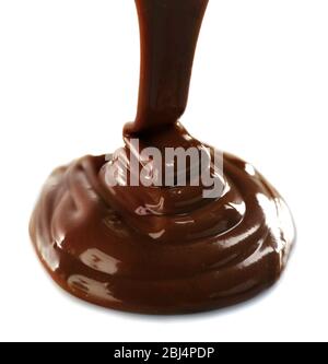 Melted milky brown chocolate pouring, isolated on white Stock Photo