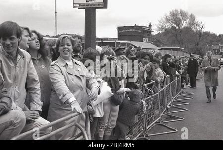 1984, historical, excited crowds at Charlton Riverside waiting for the appearance of her Majesty the Queen to Greenwich for the Official opening of the Thames Barrier, Greenwich, London, England, UK. Stock Photo
