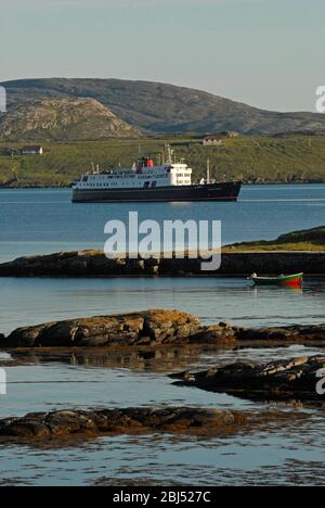 HEBRIDEAN PRINCESS approaching her overnight anchorage in the Sound of Vatersay (Caolas Bhatarsaig), off VATERSAY, OUTER HEBRIDES, SCOTLAND Stock Photo