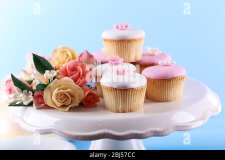 Tasty cupcake on stand, close-up Stock Photo