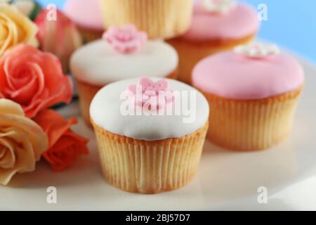 Tasty cupcake on stand, close-up Stock Photo