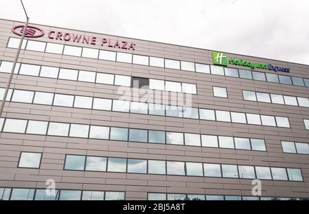 London, United Kingdom - August 03 2019:  The frontage of the Crowne Plaza and Holiday Inn hotel at Hetahrow Terminal 4 on Swindon road Stock Photo