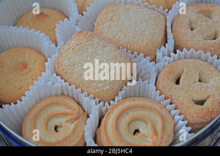 Assorted Danish cookies close-up in box. Horizontal view from above. Stock Photo