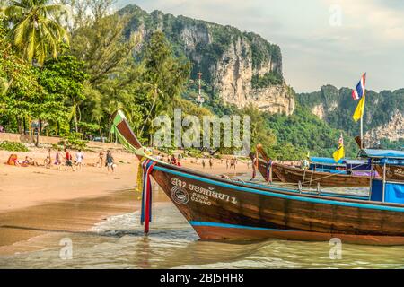 Longtail boats lined up at Ao Nang Beach near Krabi, Southern Thailand Stock Photo