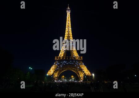 PARIS - SEPT 16, 2014: Eiffel Tower Light Performance Show in dusk. The Eiffel tower is one of the most visited monument on the world. Located on the Stock Photo