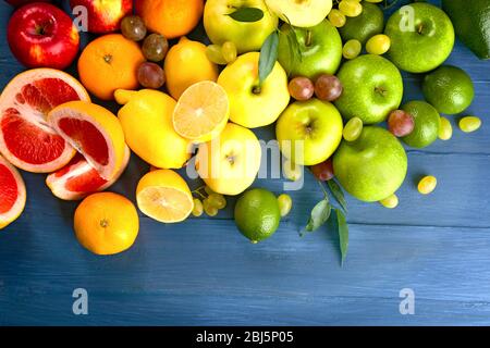 Fruits on dark blue wooden background Stock Photo