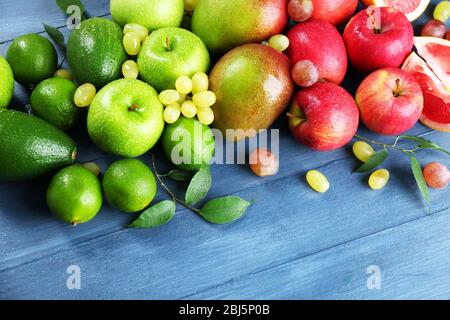 Fruits on dark blue wooden background Stock Photo