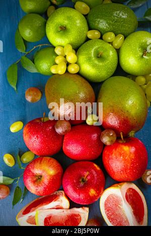 Fruits on dark blue wooden background Stock Photo