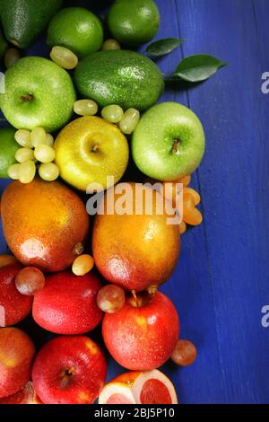 Fruits on dark blue wooden background Stock Photo