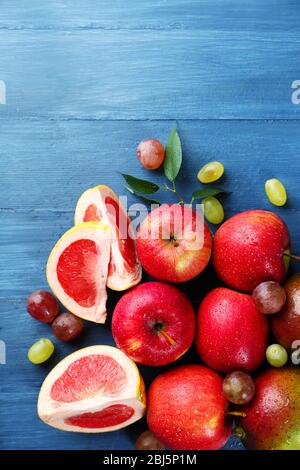 Fruits on dark blue wooden background Stock Photo