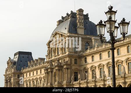 PARIS - SEPT 17, 2014: The Louvre Palace, Richelieu wing and lantern. The Louvre Museum is one of the world's largest museums and a historic monument Stock Photo