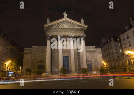 Night view of the south facade of the Church Notre-Dame-de-Lorette. It is a neoclassical church in the 9th arrondissement of Paris, France. Stock Photo