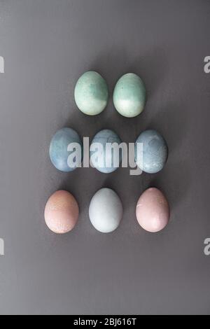 Setting easter table with colored eggs Stock Photo
